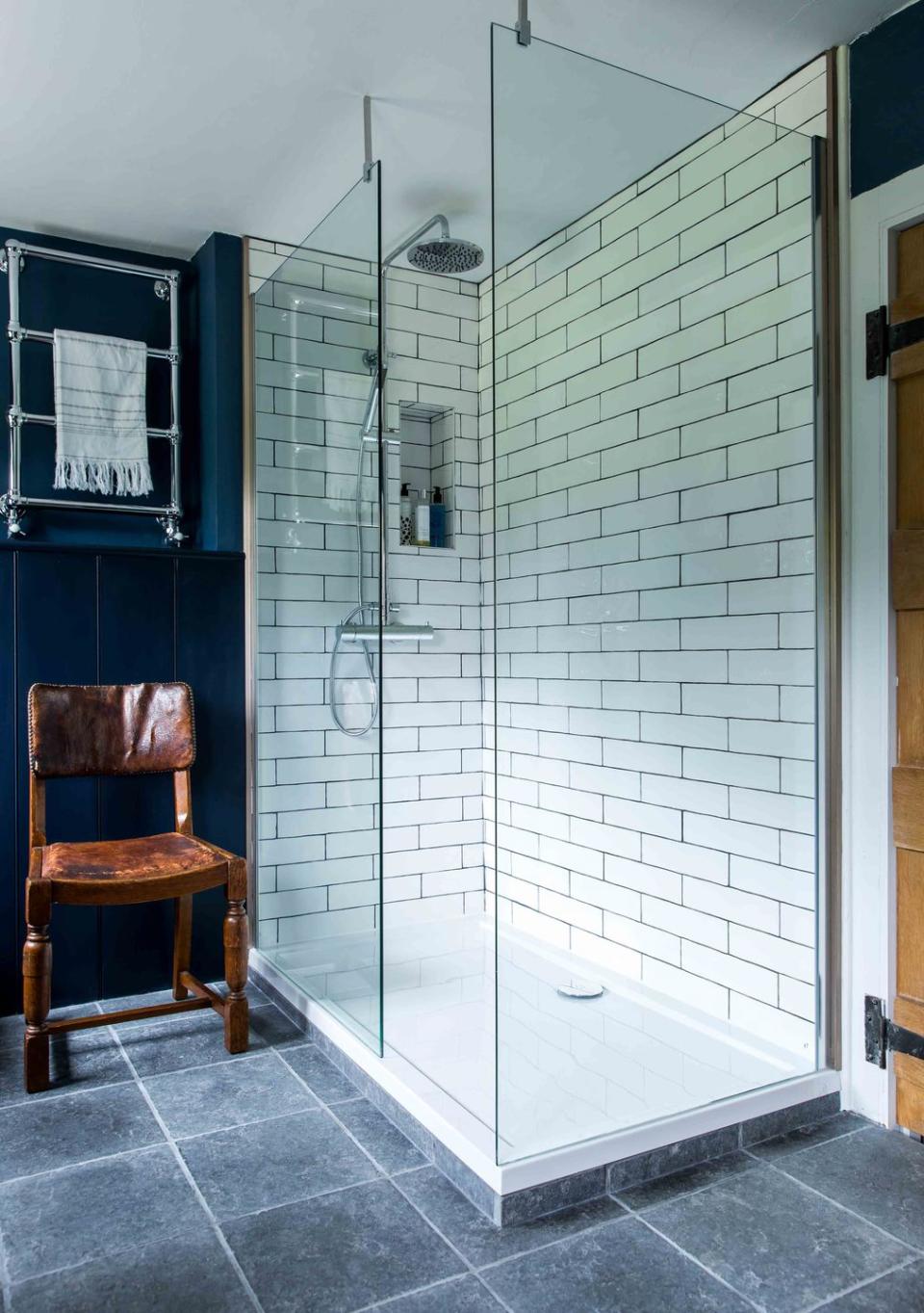 <p>A simple walk-in enclosure with a low-level tray gives a wet room effect, while the vintage chair is the perfect spot to place your towel pre-shower.<br></p><p><a class="link " href="https://www.housebeautiful.com/uk/renovate/homes-makeovers/a19478603/renovated-bathroom-makeover-bury-st-edmonds/" rel="nofollow noopener" target="_blank" data-ylk="slk:TAKE A TOUR;elm:context_link;itc:0;sec:content-canvas">TAKE A TOUR</a></p>