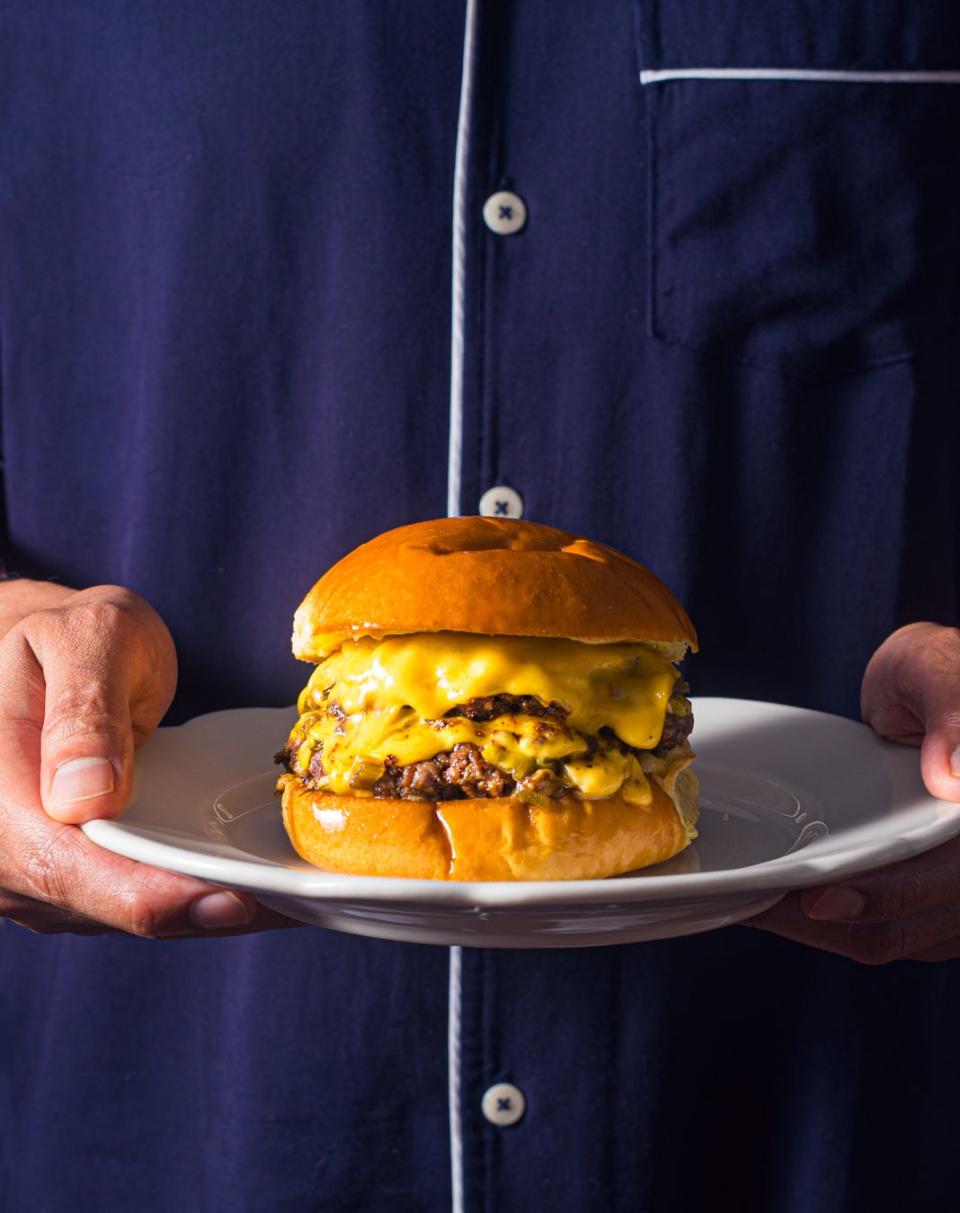 The Rebel Burger's signature burger featured beef sourced from The Chop Shop Butchery that are seasoned, smashed and char grilled and served with cheese on a brioche bun.