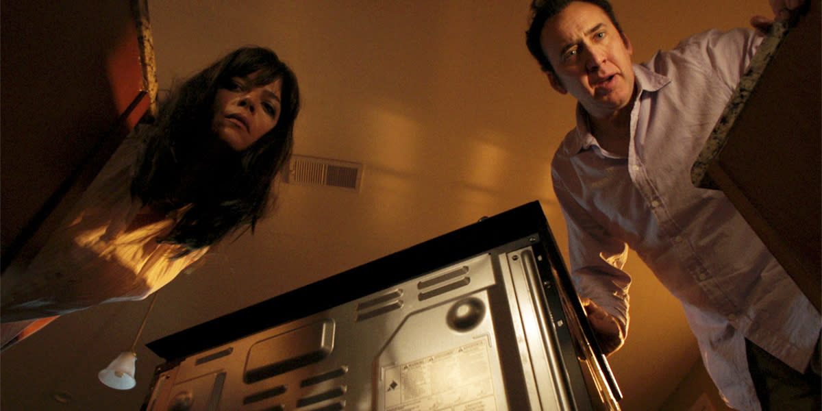 Selma Blair and Nicolas Cage as a pair of murderous parents in <em>Mom and Dad</em>. (Photo: Courtesy of TIFF)