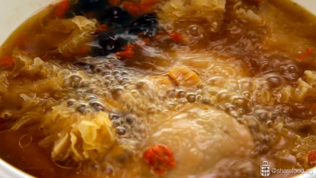 Snow Fungus Chicken Soup simmering over low heat