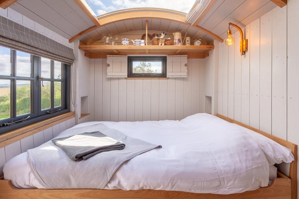 Sleep in a shepherd’s hut with skylight over the bed (Starry Skies)