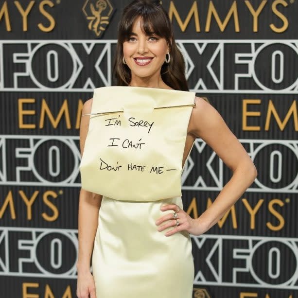 The dress went viral after social media users said the front looked similar to a post it note. Here: One user makes a Sex and the City reference