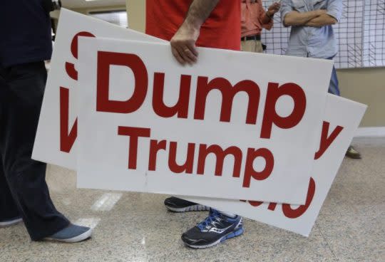 A stubborn supporter of Marco Rubio at Rubio's campaign headquarters in Miami last March. (Photo: Lynne Sladky/AP)