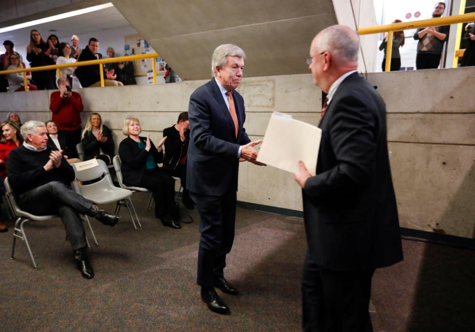 Retiring U.S. Senator Roy Blunt and Missouri State University President Clif Smart shake hands at a ground breaking for the expansion to Roy Blunt Hall, formerly known as Temple Hall, on Friday, Dec. 16, 2022.