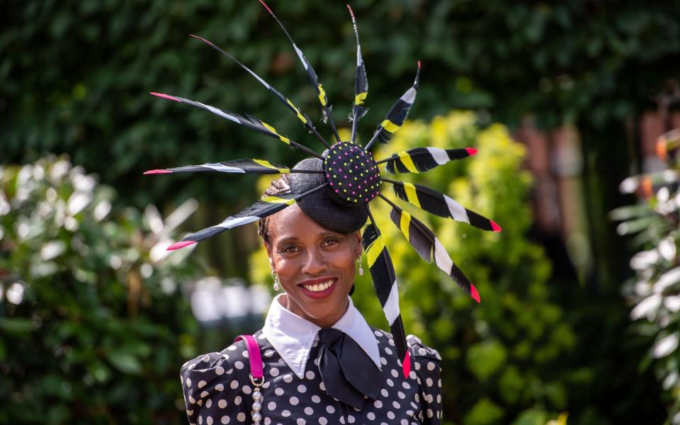 Susan Bender Whitfield poses in her windmill-shaped hat - GETTY IMAGES