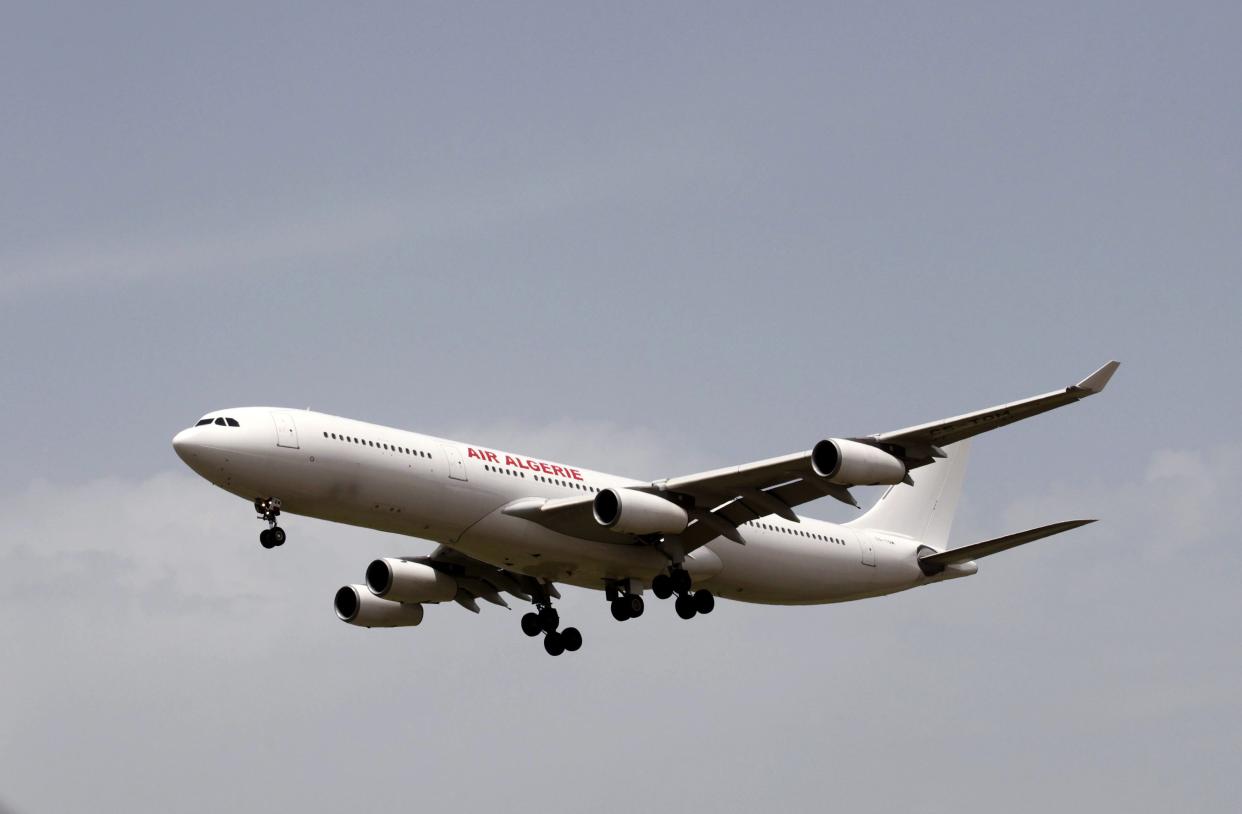 An Air Algerie Airways plane prepares to land at Houari Boumediene Airport in Algiers July 24, 2014. An Air Algerie flight crashed on Thursday en route from Ouagadougou in Burkina Faso to Algiers with 110 passengers on board, an Algerian aviation official said. REUTERS/Louafi Larbi (Algeria - Tags: DISASTER TRANSPORT)