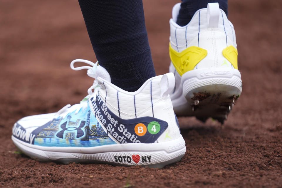 New York Yankees' Juan Soto wears custom cleats during the fifth inning of the baseball game against the Toronto Blue Jays at Yankee Stadium Friday, April 5, 2024, in New York. (AP Photo/Seth Wenig)