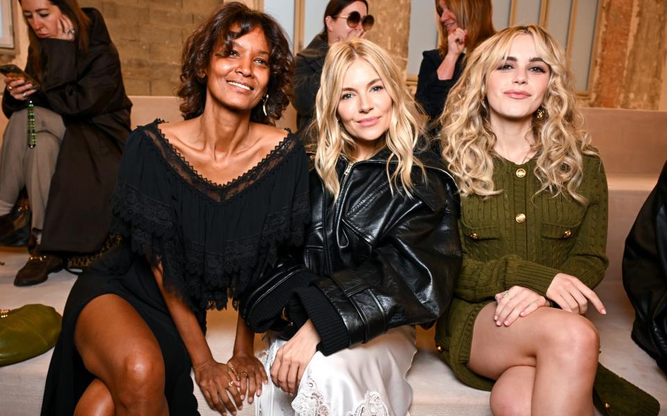 Miller on the front row with Liya Kebede and Kiernan Shipka