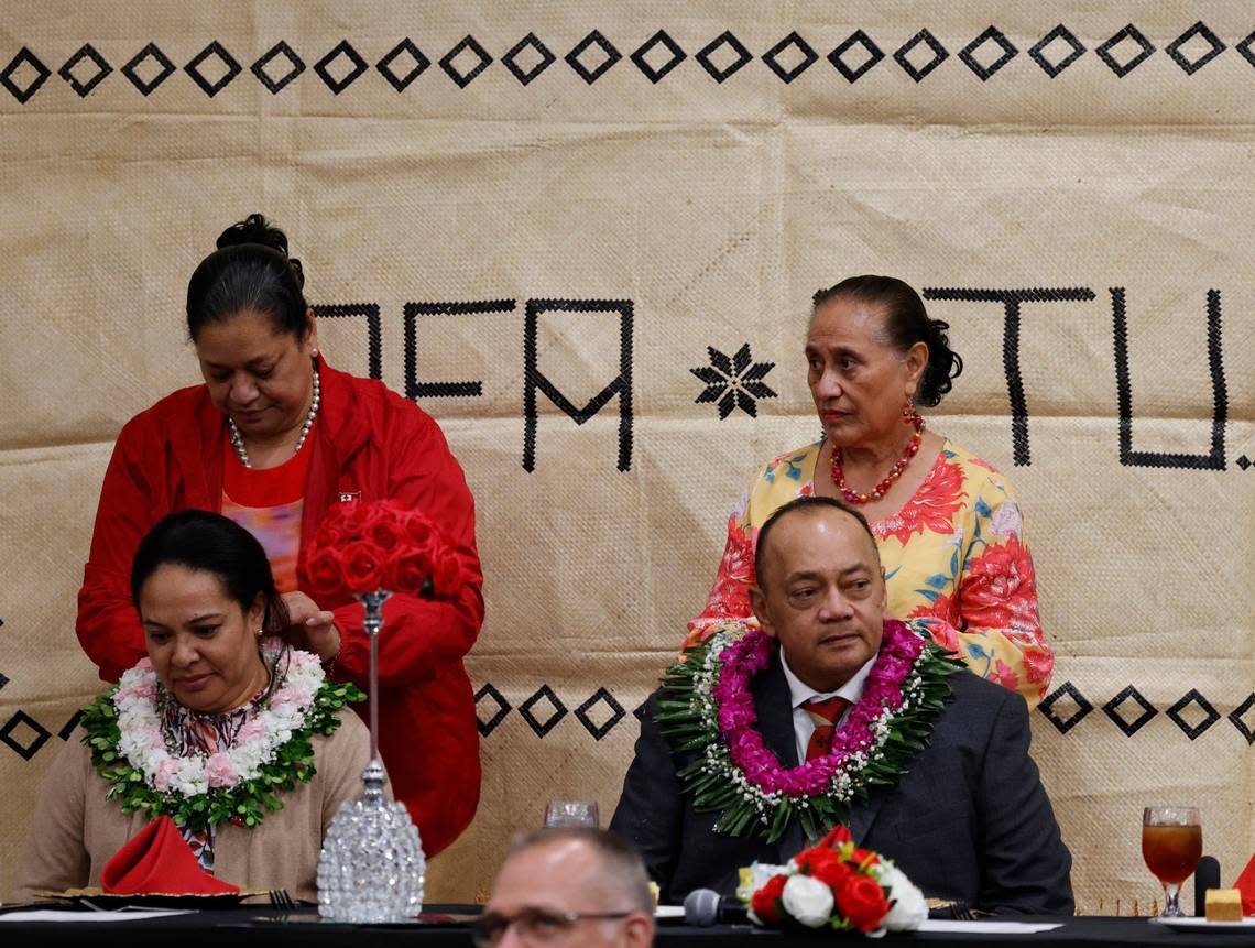 Prime Minister of the Kingdom of Tonga the Hon. Hu’akavameiliku Siaosi Sovaleni and his wife receive flower adornments during a reception Monday with the Tongan community in Euless.