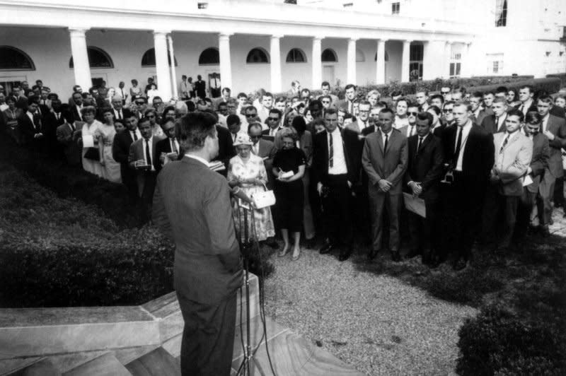 President John F. Kennedy addresses the first group of Peace Corps volunteers headed for Ghana and Tanzania on August 8, 1961. On September 22, 1961, the president signed a law giving the Peace Corps permanent status. UPI File Photo