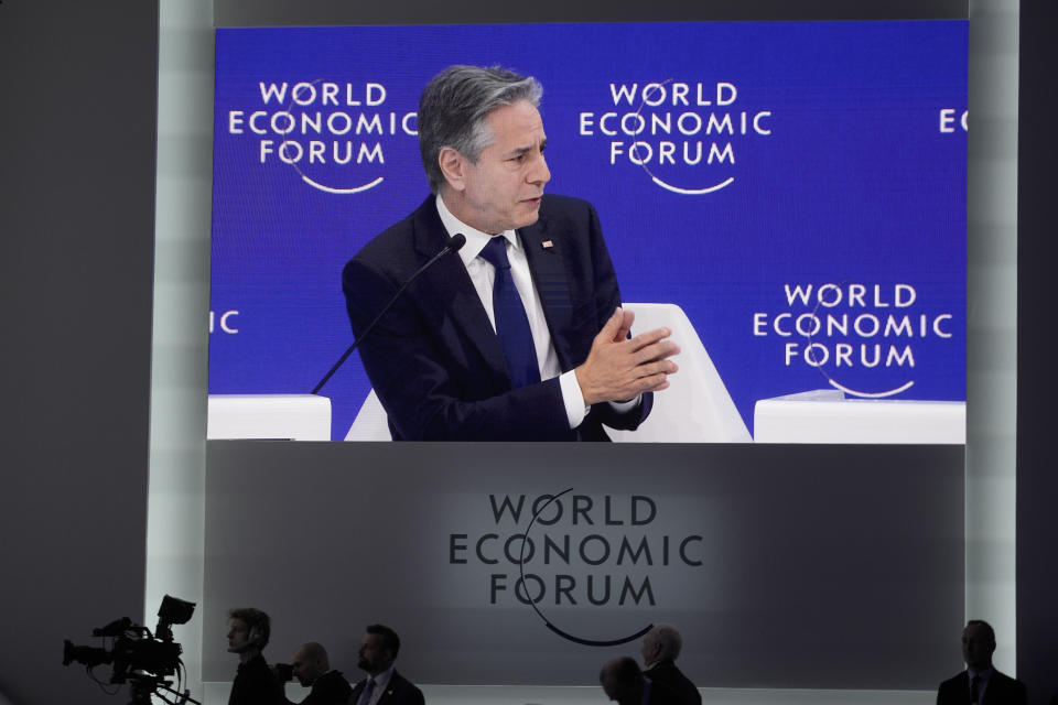 U.S. Secretary of State Antony Blinken's speech is broadcasted on a screen at the Annual Meeting of World Economic Forum in Davos, Switzerland, Wednesday, Jan. 17, 2024. The annual meeting of the World Economic Forum is taking place in Davos from Jan. 15 until Jan. 19, 2024.(AP Photo/Markus Schreiber)