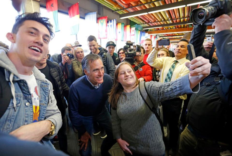 FILE-Mitt Romney poses for a photograph during a campaign event at Utah Valley University, on Feb. 16, 2018, in Orem, Utah. Romney announced earlier this month he won't seek a second term, saying younger people needed to step forward. In so doing, he threw open a wider door for those seeking to enter the race and led to speculation about whether Utah voters will choose a politically moderate successor similar to him or a farther-right figure such as Utah's other U.S. senator, Mike Lee, a Trump supporter. (AP Photo/Rick Bowmer, File)
