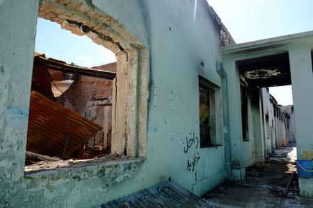 The Medecins Sans Frontieres hospital in Kunduz, Afghanistan, remains a burnt ruin about six months after it was destroyed by an American airstrike, April 26, 2016. REUTERS/ Josh Smith