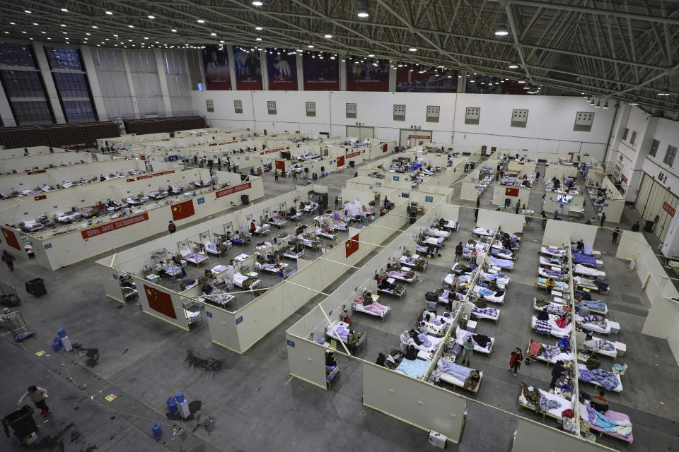 FILE - This Feb. 18, 2020, file photo, shows a temporary hospital converted from an exhibition center in Wuhan in central China's Hubei province. The hospital, one of the dozen of its kind built in Wuhan, hosted COVID-19 patients with mild symptoms. (Chinatopix via AP, File)