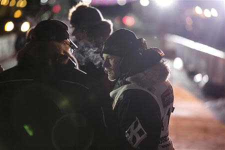 Dallas Seavey talks with reporters after his second Iditarod win just after 4am during the Iditarod dog sled race in Nome, Alaska, March 11, 2014. REUTERS/Nathaniel Wilder