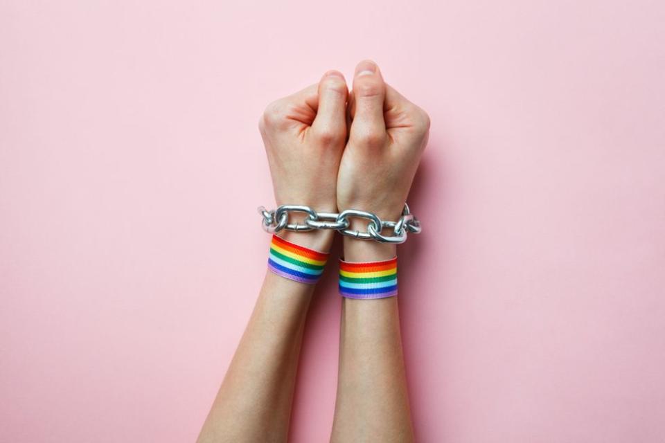 handcuffs with pride wristbands