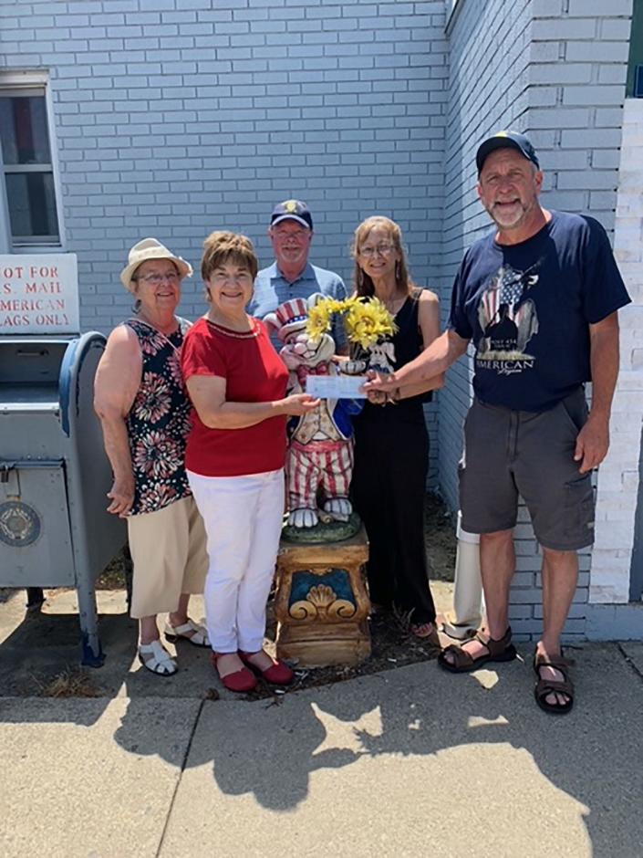 A $1,000 donation to Sparkle Fireworks Inc. was made recently by Colon's Sons of the American Legion. Taking part in the event were Mary Beth Bower, Beth Adams, Wayne Woosley, Kay Decker and Jim May.