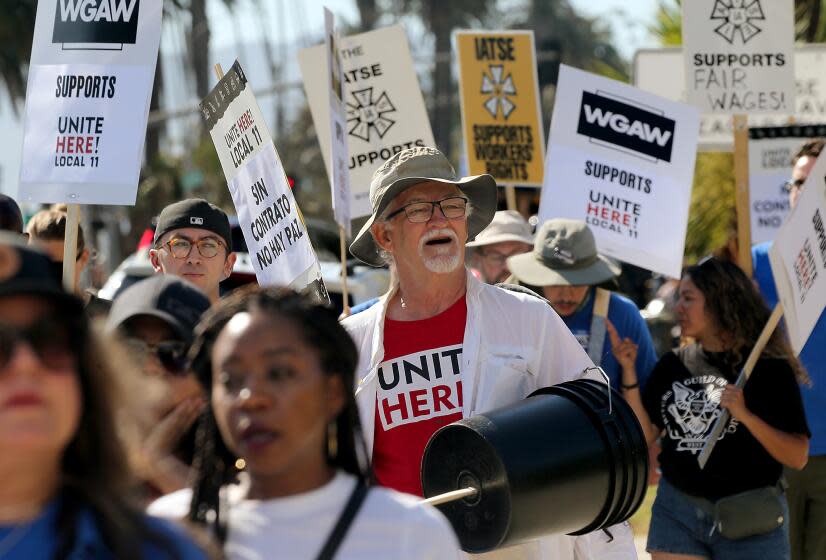 Santa Monica, CA - Members of Unite Here! Local 11 hotel workers union and members of the Writers Guild of America picket together outside the Fairmont Miramar Hotel in Santa Monica on Thursday, July 13, 2023. (Luis Sinco / Los Angeles Times)