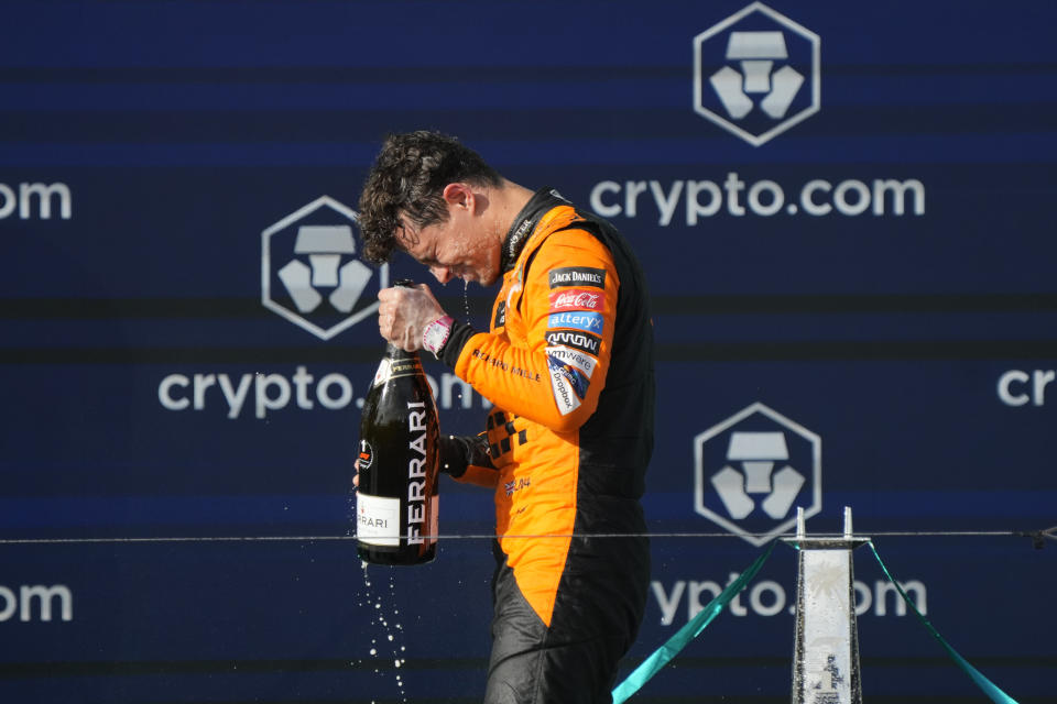 McLaren driver Lando Norris, of Britain, celebrates after winning the Formula One Miami Grand Prix auto race at the Miami International Autodrome, Sunday, May 5, 2024, in Miami Gardens, Fla. (AP Photo/Wilfredo Lee)