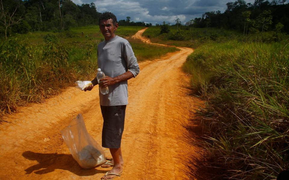 Miner Joao Batista Costa, 61, walks for days to leave the Yanomami indigenous territory ahead of expected operations against illegal mining - Edmar Barros/PA