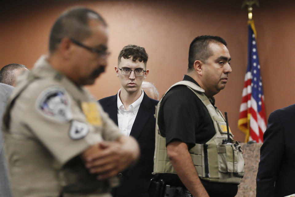 FILE - In the is Oct. 10, 2019 file photo, El Paso Walmart shooting suspect Patrick Crusius pleads not guilty during his arraignment in El Paso, Texas. The government has filed hate crime charges against Crusius, who said he was targeting Mexicans and shot to death 22 people at a Walmart store in El Paso, Texas, last summer, a person familiar with the matter told The Associated Press. (Briana Sanchez / El Paso Times via AP, Pool, File)