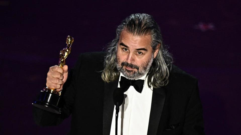 PHOTO: Hoyte van Hoytema accepts the award for Best Cinematography for 'Oppenheimer' during the 96th Annual Academy Awards in Hollywood, CA, March 10, 2024.  (Patrick T. Fallon/AFP via Getty Images)