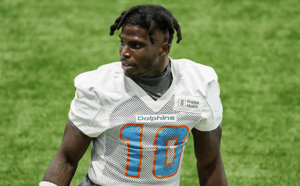 Miami Dolphins wide receiver Tyreek Hill (10) looks on during NFL football training camp at Baptist Health Training Complex in Hard Rock Stadium on Tuesday, Aug. 22, 2023 in Miami Gardens, Fla.(David Santiago/Miami Herald via AP)