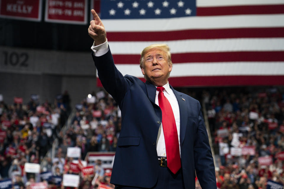FILE - In this March 2, 2020, file photo President Donald Trump arrives to speak at a campaign rally at Bojangles Coliseum in Charlotte, N.C. The president and his allies are dusting off the playbook that helped defeat Hillary Clinton, reviving it in recent days as they try to frame 2020 as an election between a dishonest establishment politician and a political outsider being targeted for taking on the system. (AP Photo/Evan Vucci, File)