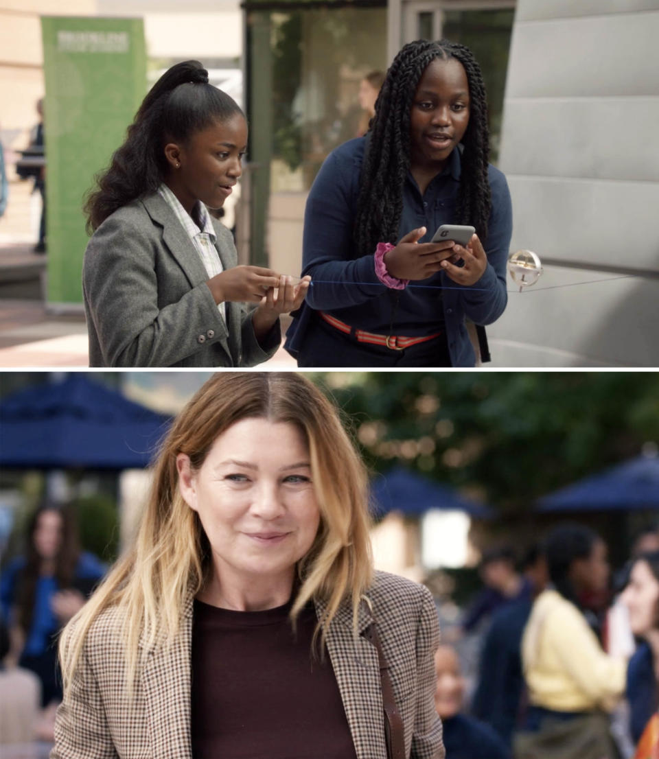 Zola and Meredith smiling at the school