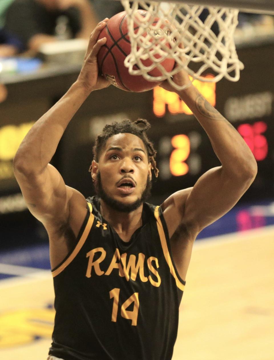 Angelo State University's Lathaniel Bastian goes up for a layup earlier in the 2021-22 season.