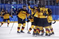 Ice Hockey - Pyeongchang 2018 Winter Olympics - Men's Playoff Match - Switzerland v Germany - Gangneung Hockey Centre, Gangneung, South Korea - February 20, 2018 - German teammates celebrate after scoring a winning goal. REUTERS/Brian Snyder