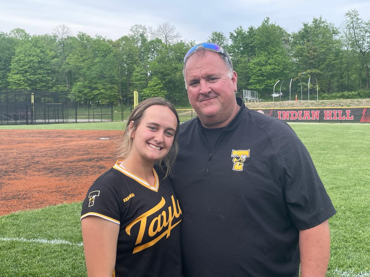 Taylor senior Camrynn Linneman (left) has been coached by her dad Craig (right) since she learned how to swing a bat.