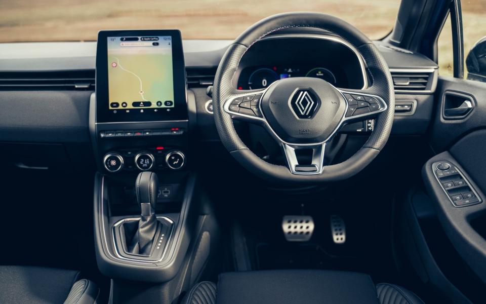 The smart dashboard, portrait-oriented touchscreen and piano key switchgear give the Renault Clio E-Tech hybrid Esprit Alpine's interior an upmarket air