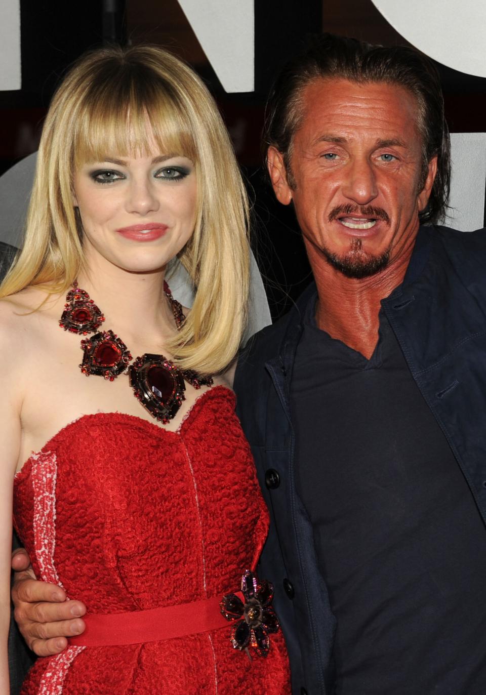 HOLLYWOOD, CA - JANUARY 07: Actors Emma Stone and Sean Penn arrive at Warner Bros. Pictures' "Gangster Squad" premiere at Grauman's Chinese Theatre on January 7, 2013 in Hollywood, California. (Photo by Kevin Winter/Getty Images)