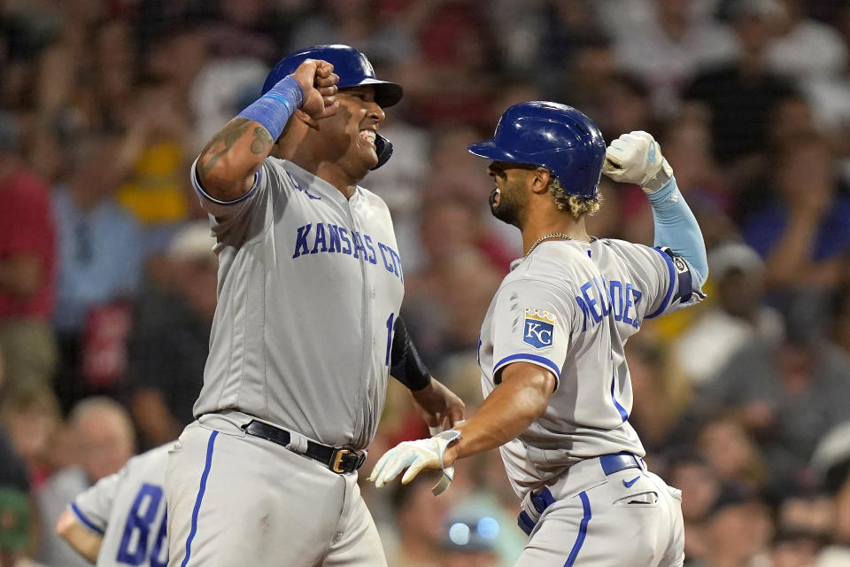 Kansas City Royals' MJ Melendez, right, celebrates with Salvador Perez as he arrives at the plate on a two-run home run against the Boston Red Sox during the sixth inning of a baseball game Tuesday, Aug. 8, 2023, in Boston. (AP Photo/Steven Senne)