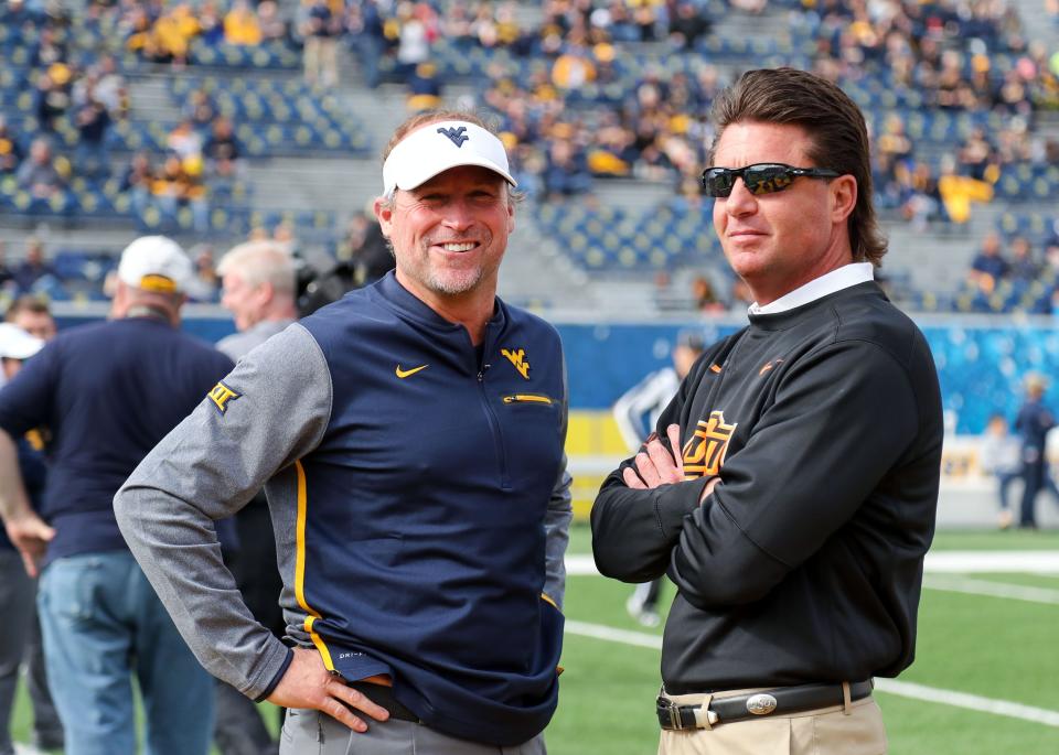 Dana Holgorsen (left) and Mike Gundy were only together on the OSU coaching staff for 10 months in 2010, but both still use principles they learned from the other.
