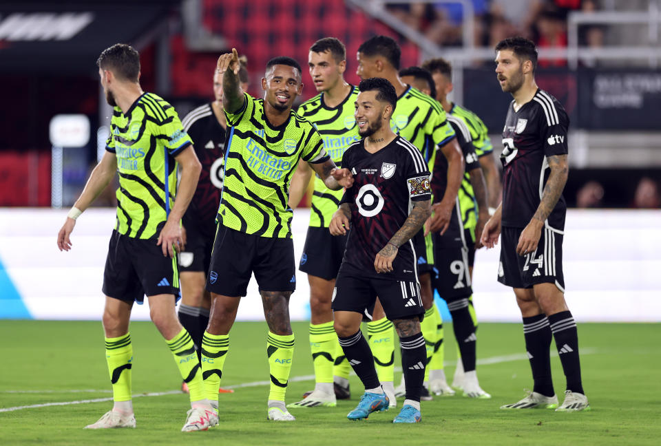 Arsenal's Gabriel Jesus (second from left) and MLS All-Star Luciano Acosta (11) line up during a free kick in the MLS All-Star Game on July 19, 2023 in Washington, DC. (Photo by Tim Nwachukwu/Getty Images)