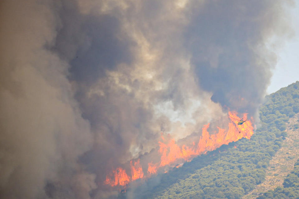 ALHAURIN EL GRANDE MALAGA, ANDA, SPAIN - JULY 15: More than a hundred professionals, 4 heavy fire fighting vehicles and 16 aerial means are working to stabilize the forest fire in the Sierra de Mijas on July 15, 2022 in Alhaurin el Grande (Malaga, Andalusia, Spain). (Photo By Alex Zea/Europa Press via Getty Images)