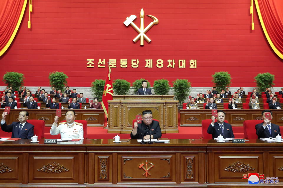 Leader of the Democratic People's Republic of Korea, Kim Jong-un, centre, speaks during the 8th Congress of the Workers' Part of Korea opening ceremony in Pyongyang. Source: EPA/KCNA