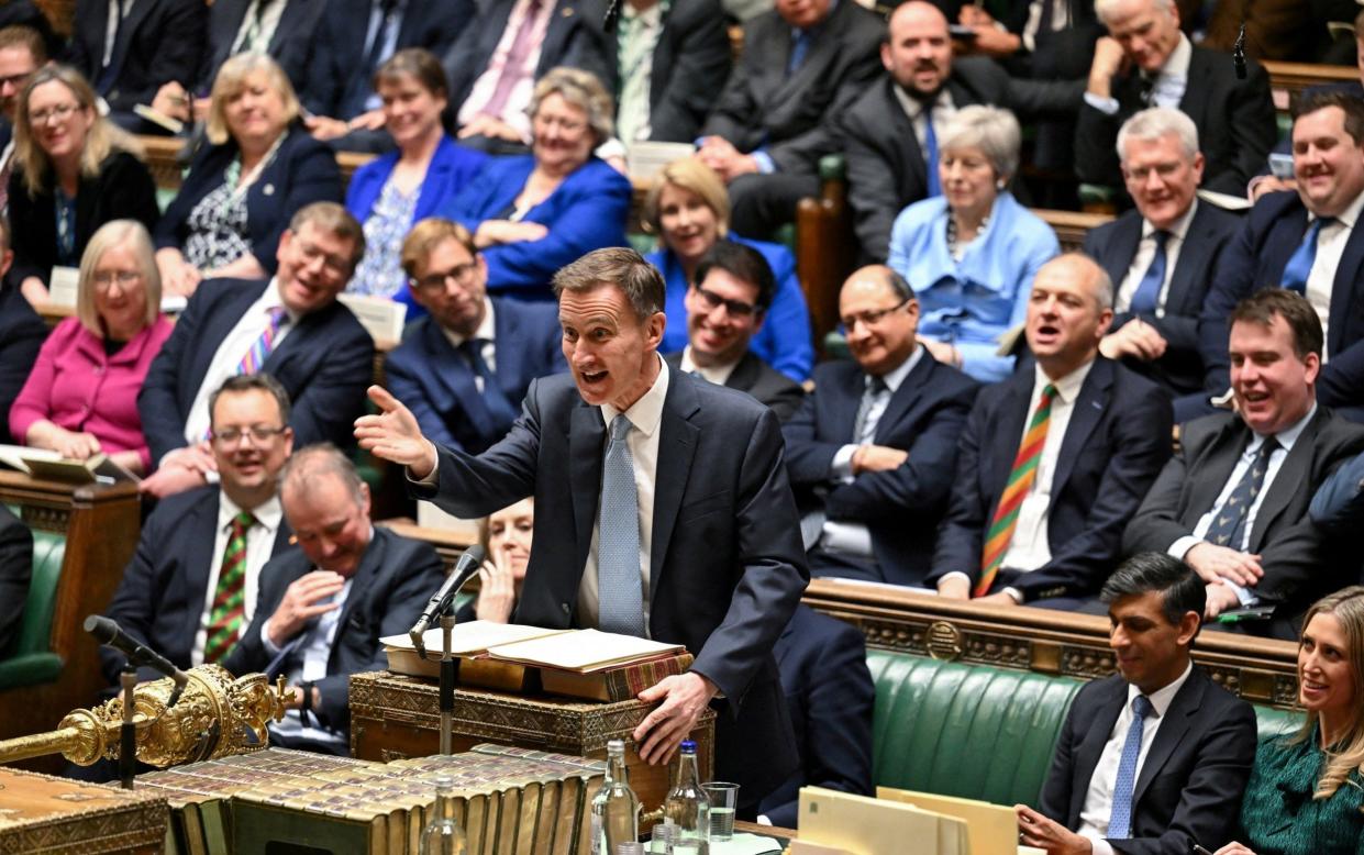 Jeremy Hunt, Chancellor of the Exchequer, presents the Financial Statement and Budget Report at the House of Commons in London on Wednesday