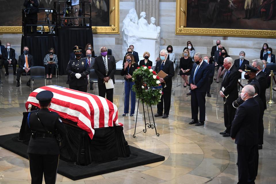 Speaker of the House Nancy Pelosi blows a kiss toward the flag-draped casket of Rep. John Lewis, D-Ga., on Monday, July 27, 2020 in the Rotunda of the U.S. Capitol in Washington. The Senate and House leaders paid their respects together, from left to right: Rep. James Clyburn, D-S.C., Senate Majority Leader Mitch McConnell, Sen. Chuck Schumer, D-N.Y., Rep. Steny Hoyer, D-Md., Rep. Kevin McCarthy, R-Texas, and Rep. Steve Scalise, R-La.