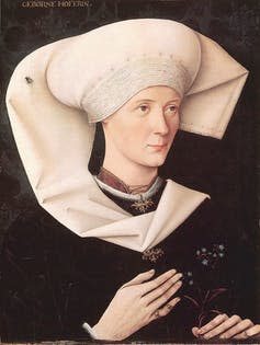 Renaissance Portrait of a woman with a fly on her head.