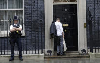 Dominic Cummings, political adviser to Britain's Prime Minister Boris Johnson, arrives at 10 Downing Street in London, Thursday, Sept. 26, 2019. An unrepentant Prime Minister Boris Johnson brushed off cries of "Resign!" and dared his foes to try to topple him Wednesday at a raucous session of Parliament, a day after Britain's highest court ruled he acted illegally in suspending the body ahead of the Brexit deadline. (AP Photo/Kirsty Wigglesworth)
