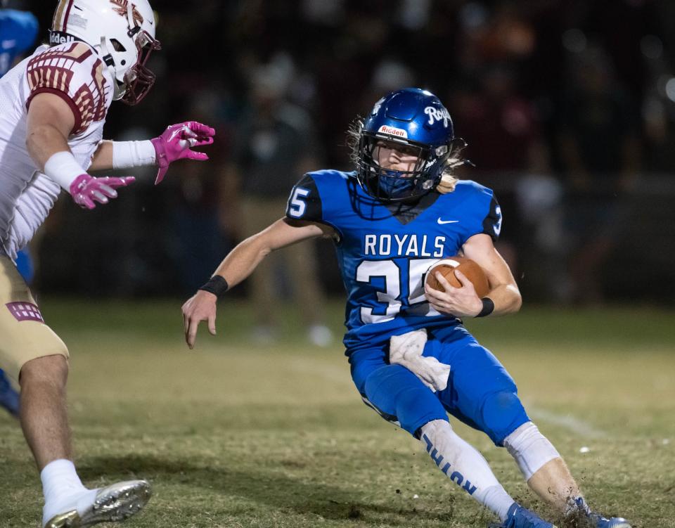 Cameron Newman (35) carries the ball during the Northview vs Jay football game at Jay High School in Jay on Friday, Oct. 14, 2022.