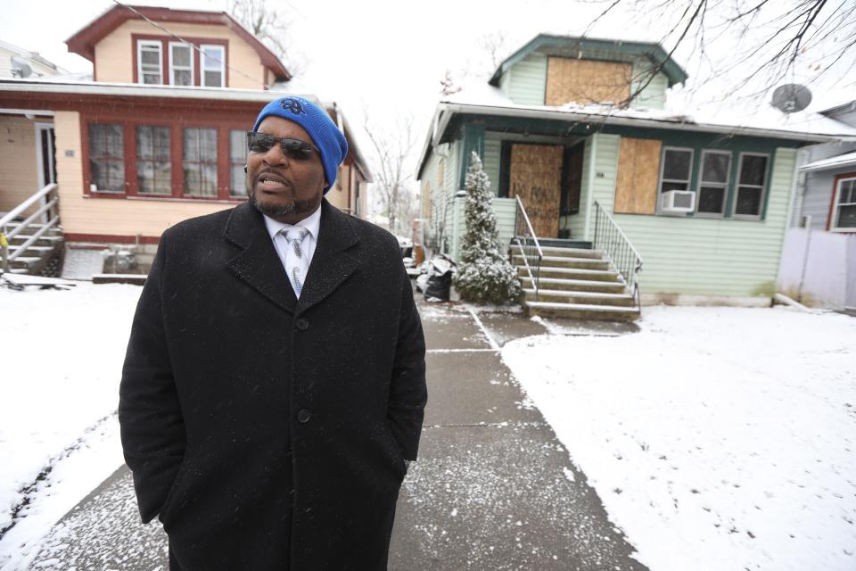 Pastor Duane Price of Cornerstone Church Ministries, outside the Liggans Dartmouth Ave. in Buffalo, on Jan. 13, talks about being grateful he is able to be there for Clarence Liggans when Liggans had called him New Year’s Eve to tell him about the fire.  Five children died in the fire and his wife, Lisa Liggans, remains in the hospital.