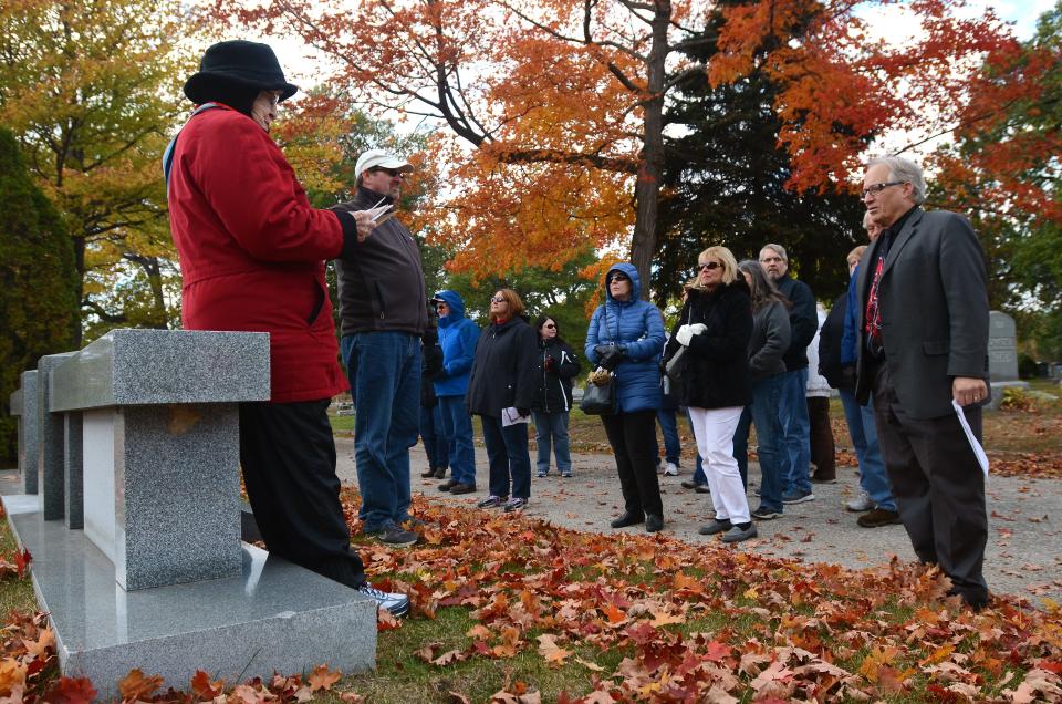 Historian Marcia Haynes talks to a group of people about the McMorran family Sunday, Oct. 18, 2015, during a historical cemetery walk at Lakeside Cemetery. Haynes passed away Friday, May 13, 2022. She was 90.