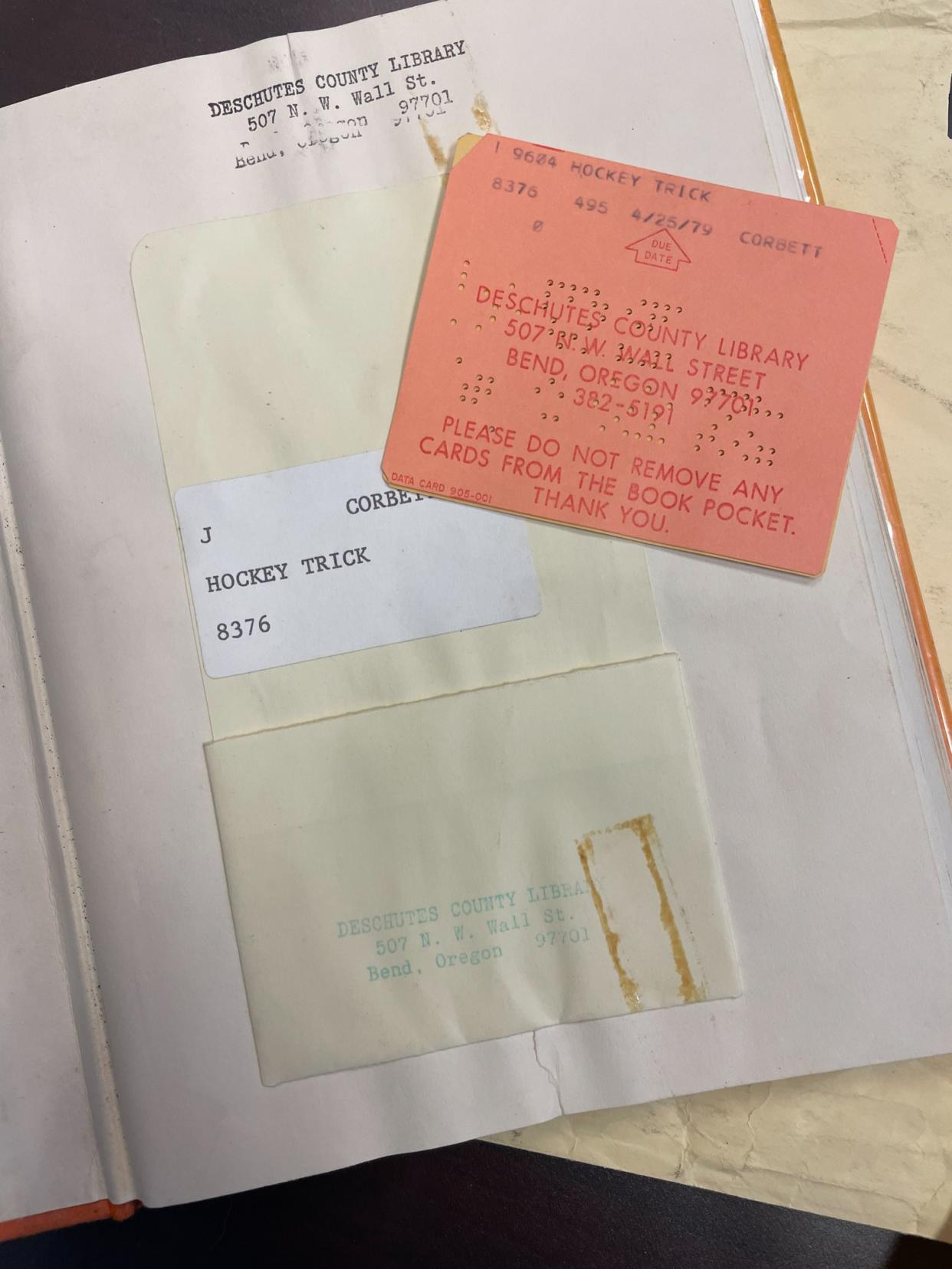 A photo of a book from the Deschutes Public Library, which was taken out in 1979 and returned in 2023