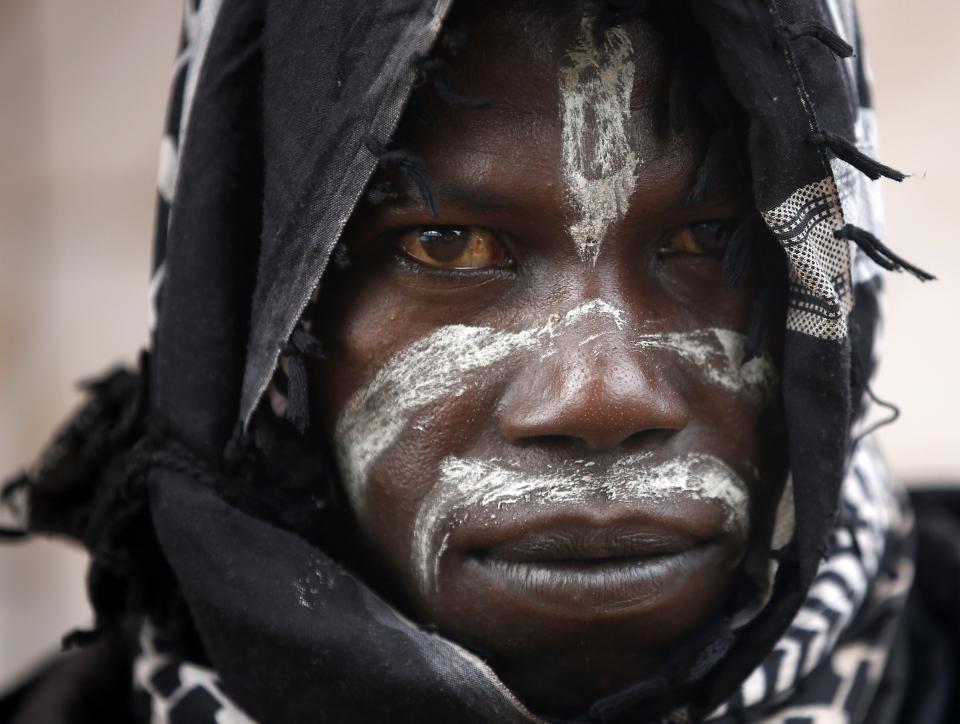 A member of anti-balaka, a Christian militia, looks on in the village of Zawa