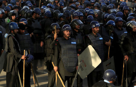 FILE PHOTO: Frontier Constabulary (FC) personnels stand guard during a sit in protest against the execution of Mumtaz Qadri outside the Parliament building in Islamabad, Pakistan, March 30, 2016. REUTERS/Faisal Mahmood/File Photo