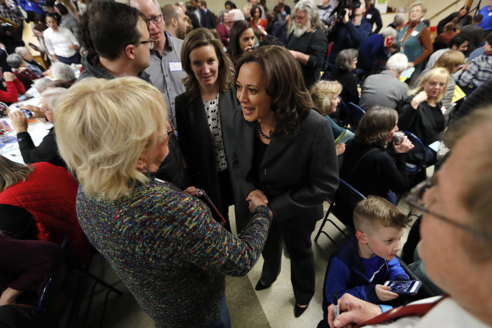 Democratic presidential candidate Sen. Kamala Harris greets local residents at the Story County Democrats' annual soup supper fundraiser, Saturday, Feb. 23, 2019, in Ames, Iowa. (AP Photo/Charlie Neibergall)